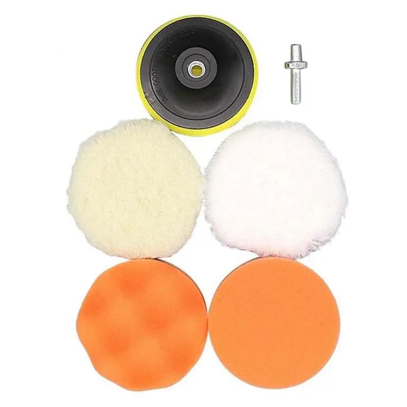 Polishing pad kit with wool and foam pads for car detailing, includes backing plate and adapter.
