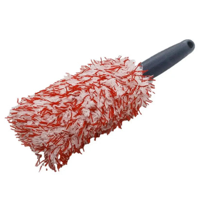 Red and white microfiber car wheel brush with gray handle.